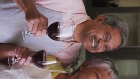 Animation of digital social media people icons over senior couple drinking wine using smartphone. global social medial, connection and communication concept digitally generated video. - Powered by Shutterstock - Get 15% off with code: PIKWIZARD15