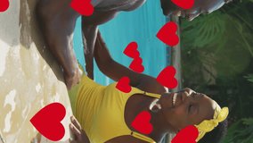 Animation of heart icons over happy african american couple embracing. Social media and digital interface concept digitally generated video. - Powered by Shutterstock - Get 15% off with code: PIKWIZARD15