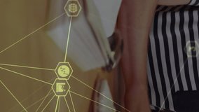 Animation of connections and data processing over caucasian male student. Global education, learning, school, digital interface and data processing concept digitally generated video. - Powered by Shutterstock - Get 15% off with code: PIKWIZARD15