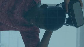 Animation of 6g text, scope scanning and circuit board elements over man wearing vr headset. global networking, technology and digital interface concept digitally generated video. - Powered by Shutterstock - Get 15% off with code: PIKWIZARD15