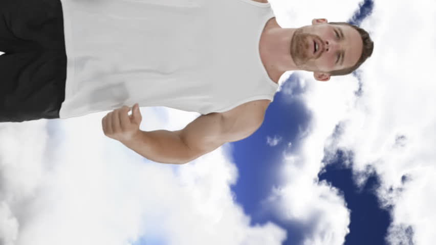 Digital animation of a Caucasian man limbering up by jumping up and down in preparation for a disk throw. The background is a view of a cloudy sky 4k