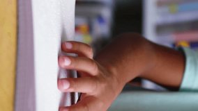 Animation of school items icons over schoolboy reading braille. back to school and education concept digitally generated video. - Powered by Shutterstock - Get 15% off with code: PIKWIZARD15