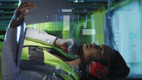 Animation of data processing over african american woman using headphones in server room. Cloud computing, digital interface and security concept digitally generated video. - Powered by Shutterstock - Get 15% off with code: PIKWIZARD15