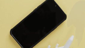 Animation of media icons over plane and smartphone. Social media and travel concept, digitally generated video. - Powered by Shutterstock - Get 15% off with code: PIKWIZARD15