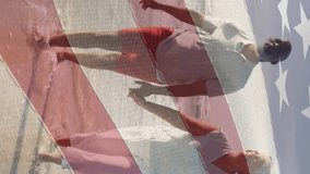 Animation of flag of usa over happy senior couple in love walking on beach. American patriotism, nationality, summer and diversity concept digitally generated video. - Powered by Shutterstock - Get 15% off with code: PIKWIZARD15