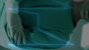 Animation of data processing over caucasian male surgeon in hospital. Global medicine, healthcare, connections, computing and data processing concept digitally generated video. - Powered by Shutterstock - Get 15% off with code: PIKWIZARD15