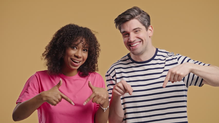 Interracial Couple Bloggers Pointing Down, Advertising Adds. Click to Subscribe 
