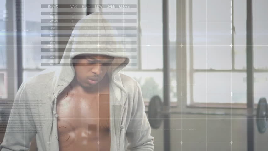 Athletic man starting workout by breathing and activating data overlays over windows for tracking. Fitness, strength, concentration, determination, technology, modern, performance