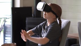 Young caucasian happy preteen teenager schoolgirl daughter wearing VR glasses, playing video games online. A child wearing VR glasses. virtual reality simulator. 3D gadget technology. - Powered by Shutterstock - Get 15% off with code: PIKWIZARD15