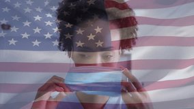 Healthcare worker lifting mask and securing fit, protecting patients with American flag overlay. Medical, protective, healthcare, prevention, professional, safety, clinical - Powered by Shutterstock - Get 15% off with code: PIKWIZARD15