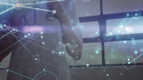 Medical professional grasping stethoscope as closeup shot pulling back, showcasing network overlay. Healthcare, telemedicine, digital health, medical technology, professional, clinical, innovation - Powered by Shutterstock - Get 15% off with code: PIKWIZARD15