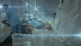 Female doctor tapping tablet screen and monitoring patient vitals with animated data HUD in ward. Healthcare, digital, innovation, technology, diagnostics, medical, professional - Powered by Shutterstock - Get 15% off with code: PIKWIZARD15