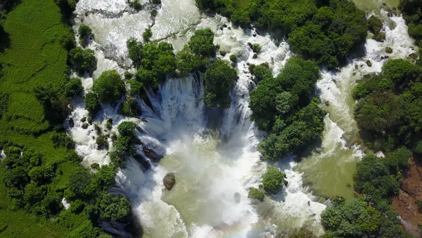 Aerial view of Ban Gioc Waterfalls with lush green surroundings