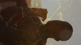 Animation of network of connections over exercising african american man. Global connections, wellbeing, fitness and healthy lifestyle concept digitally generated video. - Powered by Shutterstock - Get 15% off with code: PIKWIZARD15