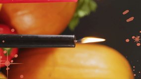 Animation of orange stars over kwanzaa candles and pumpkins. Kwanzaa festivity, celebration and tradition concept digitally generated video. - Powered by Shutterstock - Get 15% off with code: PIKWIZARD15