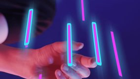 Animation of glowing light trails of data transfer over asian woman using vr headset. Global virtual reality, computing, digital interface and data processing concept digitally generated video. - Powered by Shutterstock - Get 15% off with code: PIKWIZARD15