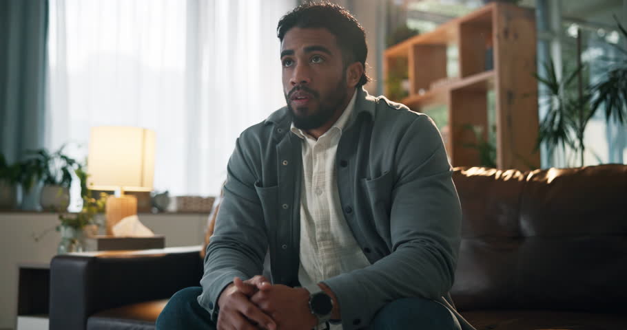 Frustrated man, headache and sofa with stress for fail, mistake or disappointment in home. Male person, anxiety and strain with doubt for mental health, depression or emotional fatigue in house