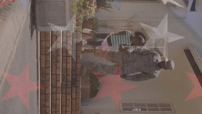 Animation of flag of usa over caucasian african american male soldier with his daughter. patriotism and celebration concept digitally generated video. - Powered by Shutterstock - Get 15% off with code: PIKWIZARD15