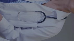 DNA strand animation over doctor and patient in medical consultation. Genetics, healthcare, science, biotechnology, laboratory, research - Powered by Shutterstock - Get 15% off with code: PIKWIZARD15