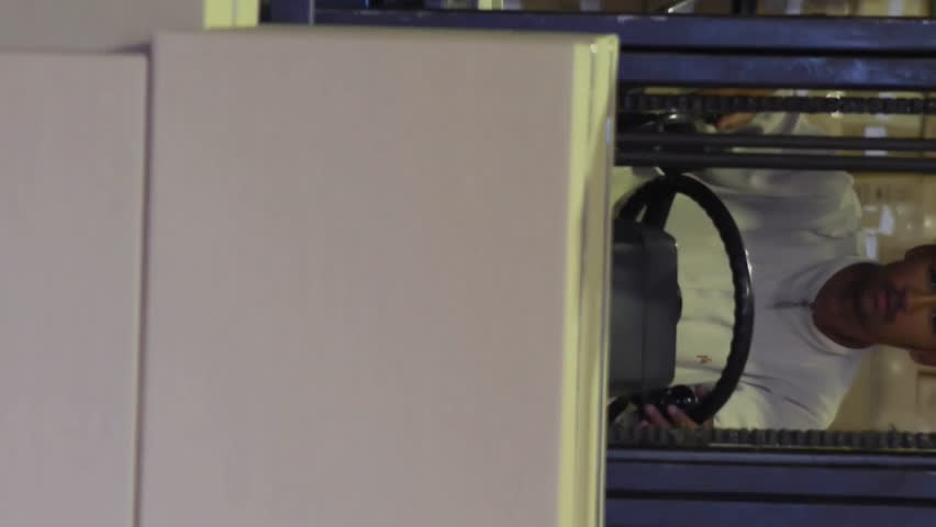 In warehouse, forklift operator moving boxes with data analytics animation overlay. Logistics, industrial, technology, transportation, automation, supply chain - Powered by Shutterstock - Get 15% off with code: PIKWIZARD15