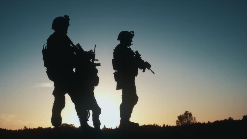 Silhouette of Soldiers Stand With Rifles. Professional Army Guarding People. Special Operation, Modern Military Ready for Battlefield Warfare Action. Dramatic Standing on a Victory Hill