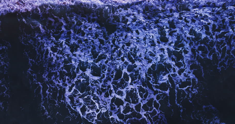 Aerial view of the dark ocean background Ripples and waves on deep water surface High definition sea background