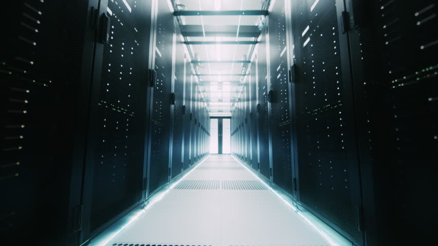 Moving Camera Shot: Modern Data Center, Passing Rows of Active Server Racks. Cloud Computing, Artificial Intelligence, Machine Learnin, Neural Network Hub - Powered by Shutterstock - Get 15% off with code: PIKWIZARD15