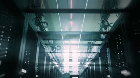 Hacker in a Hoodie Stands in a Data Center Aisle, Using a Laptop to Execute a Virus Cyber Attack. Server Room Hacking, Cyber Security Threats, and Vulnerabilities Within Modern Server Room - Powered by Shutterstock - Get 15% off with code: PIKWIZARD15