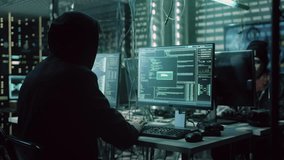 Hacker Uses Multiple Monitors, Typing Code and Accessing Data. Computer Screens Display Programming, Network Activity, and Cyber Security Information, Hacking, Cybercrime Activity - Powered by Shutterstock - Get 15% off with code: PIKWIZARD15