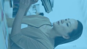 Animation of social media reactions and graphs over asian woman in office. Social media, communication, business and technology concept digitally generated video. - Powered by Shutterstock - Get 15% off with code: PIKWIZARD15