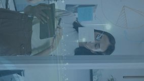 Animation of cityscape with shield icon over diverse business people in office. Global business, computing and digital interface concept digitally generated video. - Powered by Shutterstock - Get 15% off with code: PIKWIZARD15