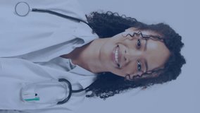 Animation of data processing over female doctor smiling. Global medicine and digital interface concept digitally generated video. - Powered by Shutterstock - Get 15% off with code: PIKWIZARD15