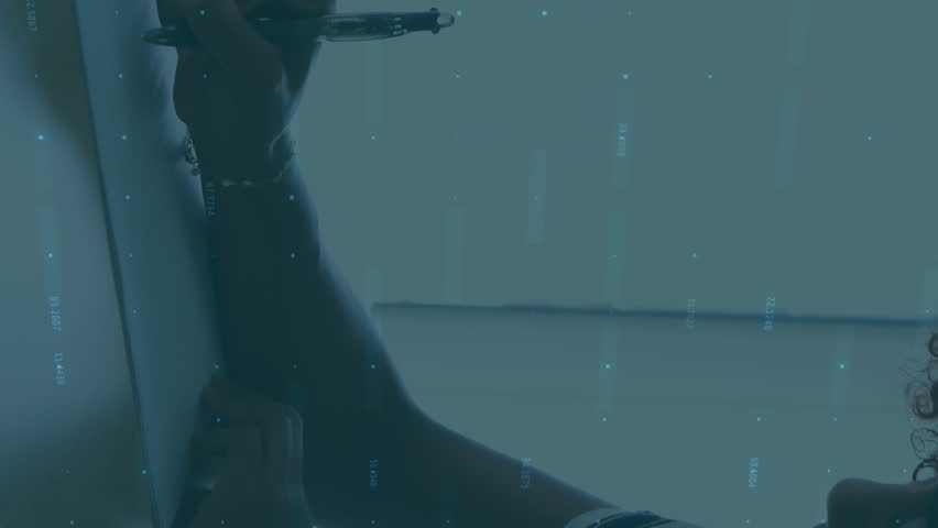 Animation of and data processing over rugby player. Global business connections digital interface and technology concept digitally generated video. - Powered by Shutterstock - Get 15% off with code: PIKWIZARD15