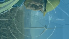 Animation of financial data processing over caucasian engineer and wind turbine. Global wind energy, sustainability, business, computing and data processing concept digitally generated video. - Powered by Shutterstock - Get 15% off with code: PIKWIZARD15