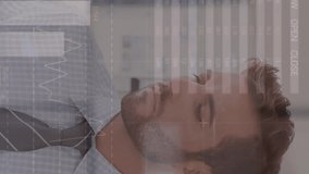 Animation of infographic interface over smiling caucasian man talking on cellphone in office. Digital composite, multiple exposure, report, business, growth, progress, global and technology concept. - Powered by Shutterstock - Get 15% off with code: PIKWIZARD15