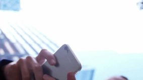 Animation of globe with network and icons over businesswoman using smartphone. Global connections, computing and data processing concept digitally generated video. - Powered by Shutterstock - Get 15% off with code: PIKWIZARD15