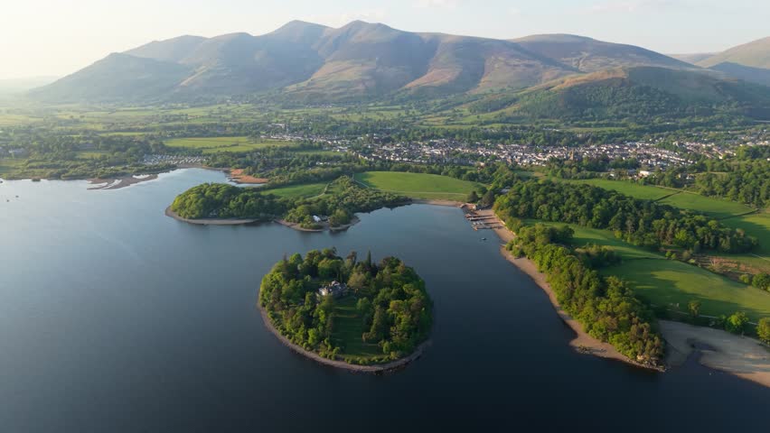 Aerial panoramic landscape above Derwentwater lake in the Lake District National Park, UK at sunrise looking from Catbells towards Skiddaw mountain in the Northern Falls