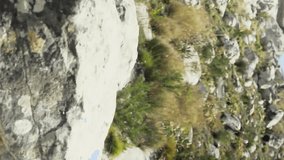 Stacking rocks on hike, man surrounded by social media likes animation. Hiking, nature, mindfulness, outdoors, adventure, engagement - Powered by Shutterstock - Get 15% off with code: PIKWIZARD15