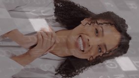 Smiling woman in lab coat with financial data animation overlay. Businesswoman, technology, analysis, finance, innovation, professional - Powered by Shutterstock - Get 15% off with code: PIKWIZARD15