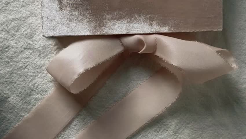 Luxury velvet photo album with silk ribbon. Handcrafted from 100% silk velvet, with pockets for photos. Perfect as a wedding album, guest book, or family keepsake.