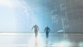 Senior athletes stepping forward on beach activating tech holographic panels with world map display. Futuristic, technology, collaboration, environmental, innovation, visualization, health - Powered by Shutterstock - Get 15% off with code: PIKWIZARD15