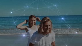 Couple playing shoreline under pulsing tech overlay as woman running toward man leaping on back. Romance, outdoor, leisure, connection, futuristic, motion, harmony - Powered by Shutterstock - Get 15% off with code: PIKWIZARD15