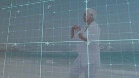 Woman shifting weight, doing tai chi at beach for fitness with digital grid guiding balance. Meditation, mindfulness, serenity, movement, wellness, landscape, harmony - Powered by Shutterstock - Get 15% off with code: PIKWIZARD15