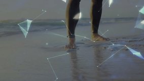 Man stepping into surf and creating 3D globe technology overlay while hoisting windsurf sail. Futuristic, digital, geometric, holographic, innovative, outdoor, adventure - Powered by Shutterstock - Get 15% off with code: PIKWIZARD15