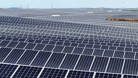 Exploring the vast solar panel fields of Portugal from above during a clear sunny day - Powered by Shutterstock - Get 15% off with code: PIKWIZARD15