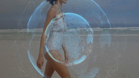 Woman walking on beach activating rotating digital globe showing global technology connectivity. Technology, connectivity, globalization, innovation, digital, network, horizon - Powered by Shutterstock - Get 15% off with code: PIKWIZARD15