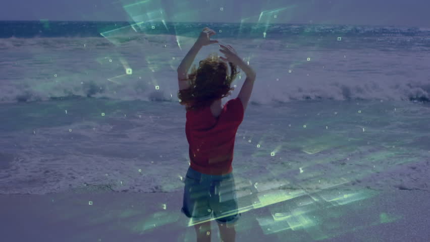 Woman arriving shore raising arms rotating into dance syncing with waves via tech data overlay. Adventure, serenity, movement, vitality, outdoor, minimalism, energy