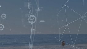 Camera panning revealing runner jogging on beach with tech overlay linking data points to motion. Outdoor, fitness, digital, visualization, sport, wellness, scenery - Powered by Shutterstock - Get 15% off with code: PIKWIZARD15