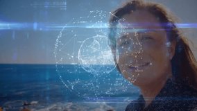 woman standing shore materializing holographic orb overlaying face enabling tech data visualization. Futuristic, immersive, innovative, digital, conceptual, serene, technology - Powered by Shutterstock - Get 15% off with code: PIKWIZARD15