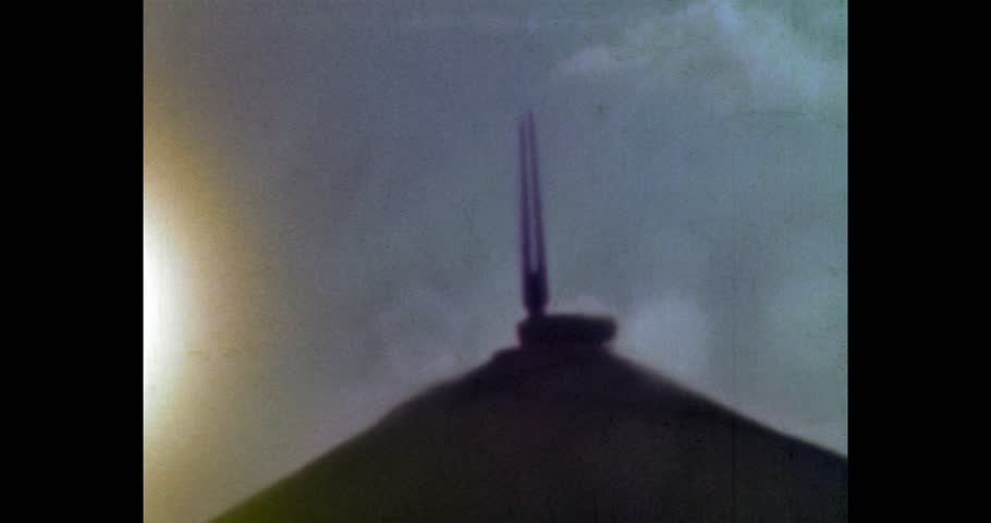 Tall spire on a hill. Memorial honoring Soviet soldiers who fought in World War II in Belarus. Mound of Glory Minsk. Archival video, 1970s